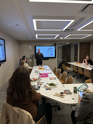 Educators learn about the elements of photography from artist and photographer, Lisa Lindvay, before taking their own polaroid pictures, during the Photographing Frank Lloyd Wright session.