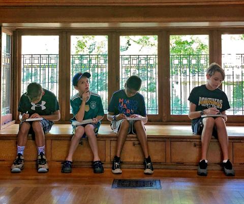 young kids sketching in Children's Playroom